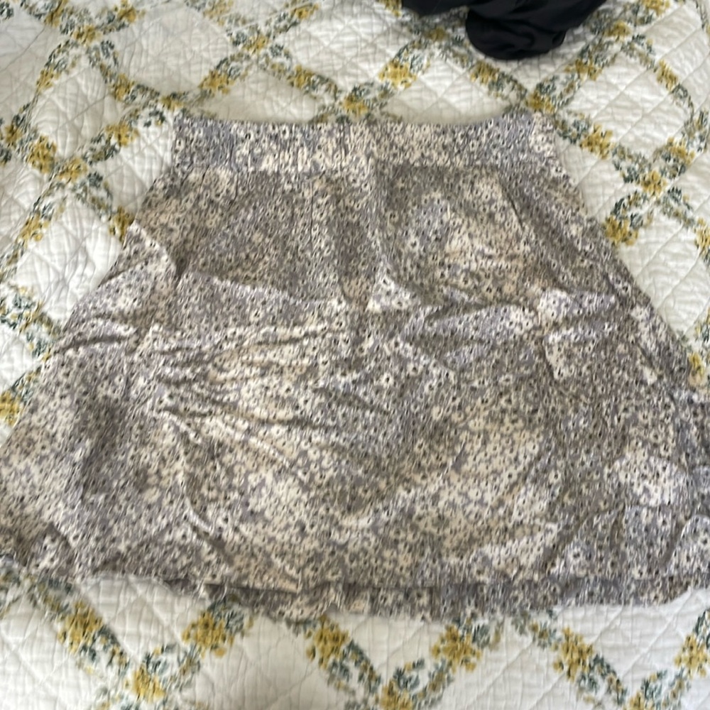 This is a mini skirt in size small. I’m actually not sure where it’s from.